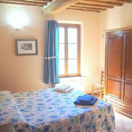 Nell'Antica Torre Di Fronte A Siena Apartment Bagian luar foto
