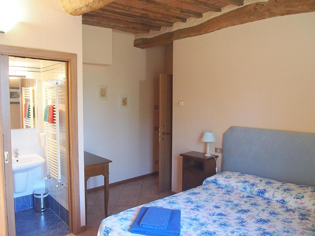 Nell'Antica Torre Di Fronte A Siena Apartment Bagian luar foto