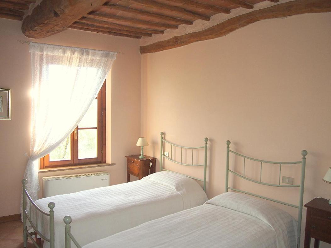 Nell'Antica Torre Di Fronte A Siena Apartment Bagian luar foto